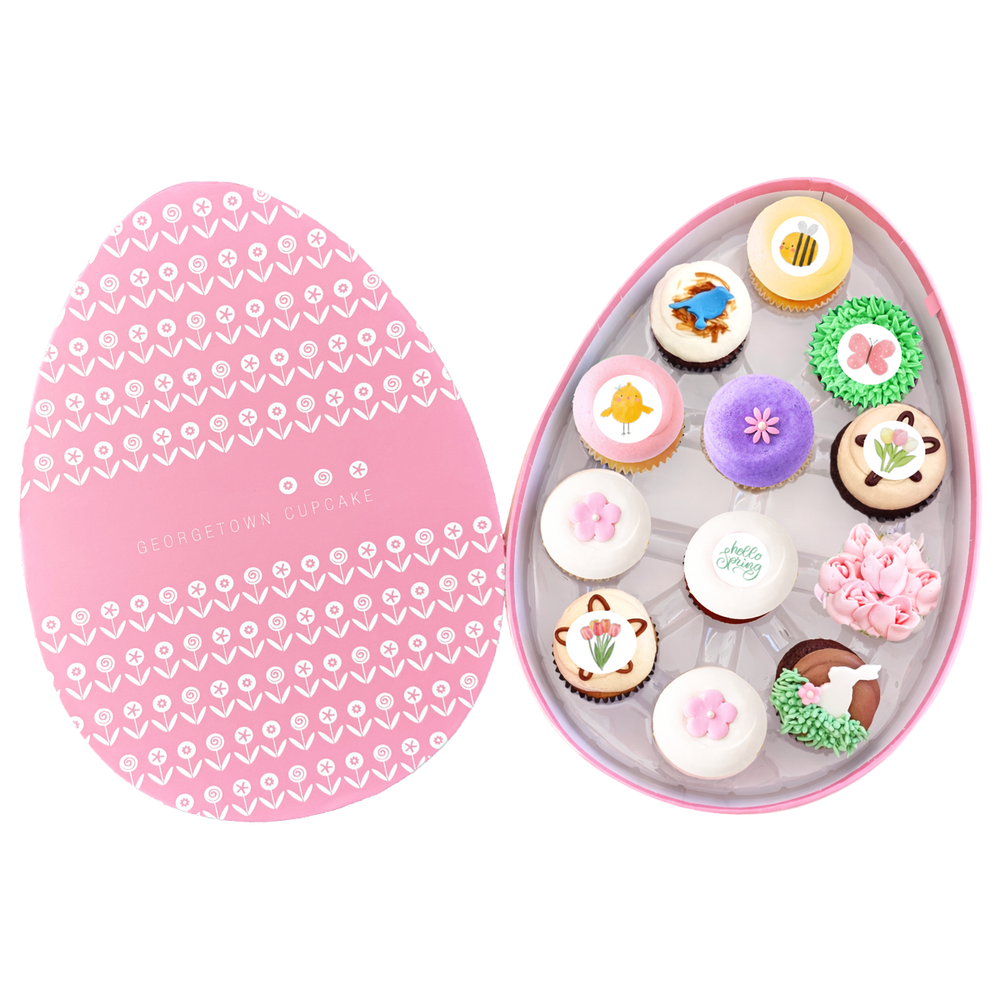 Spring cupcakes in a pink egg-shaped gift box with floral design