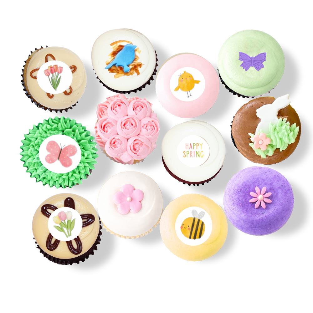 Spring cupcakes with pastel frosting, flowers, butterflies, bees, and bunny designs