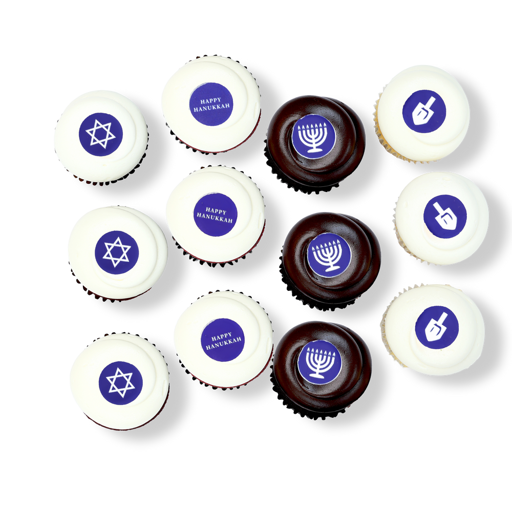 Hanukkah cupcakes with Star of David, menorah, and dreidel decorations