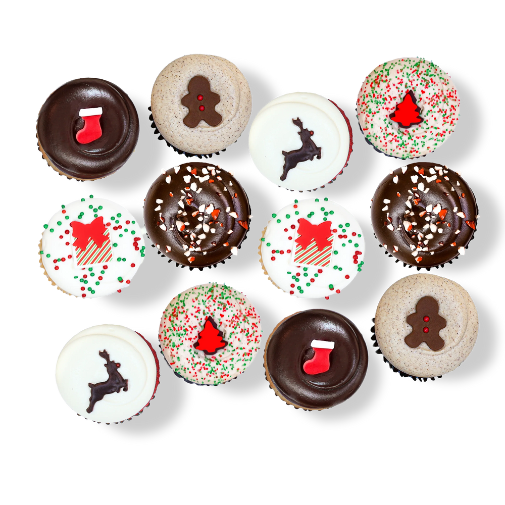 Christmas cupcakes with reindeer and holiday-themed toppings