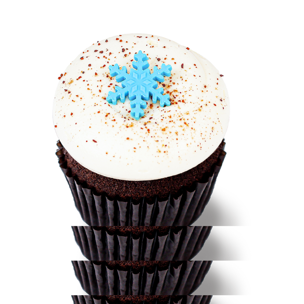 Chocolate cupcake with nutmeg dusting and snowflake