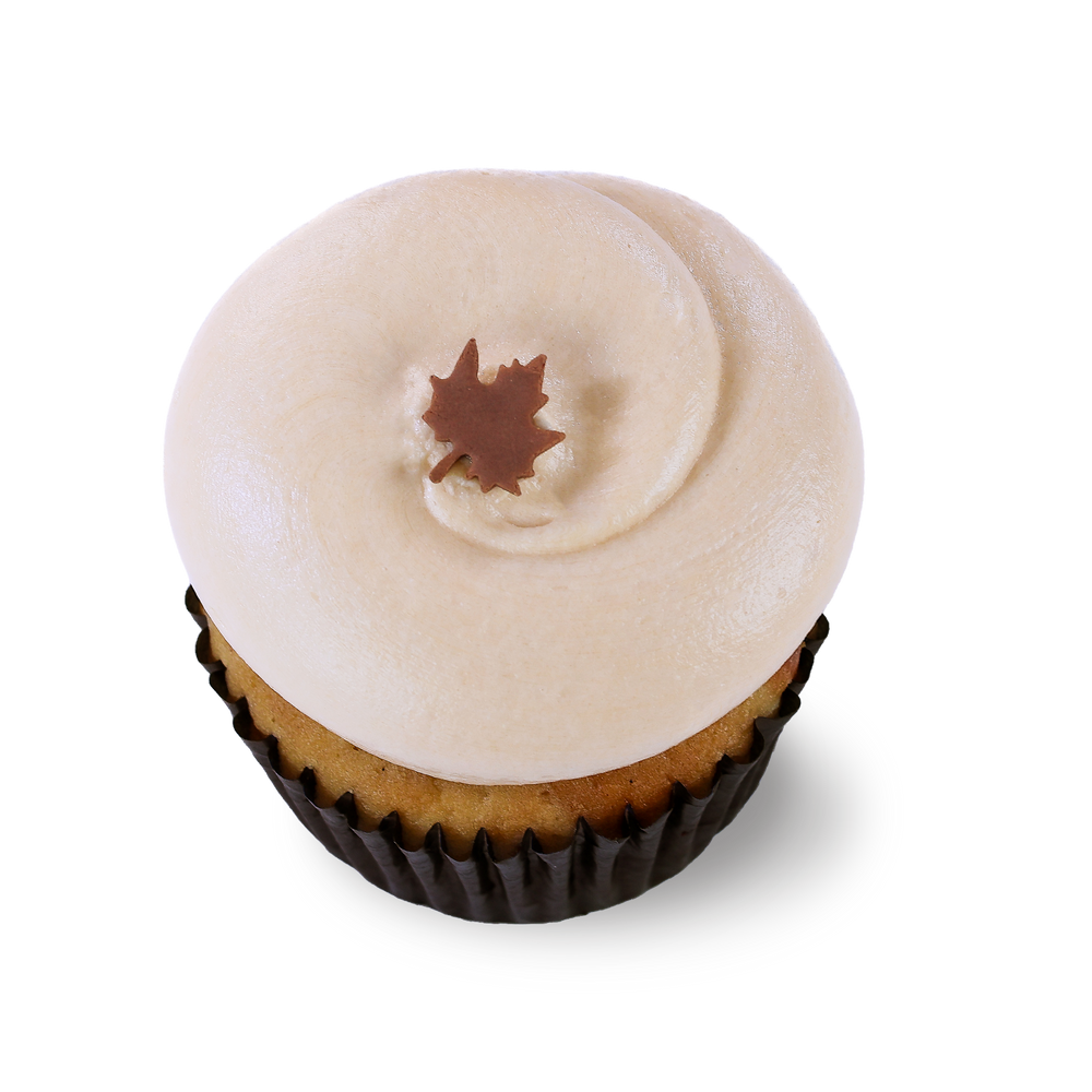 Pumpkin cheesecake cupcake with maple leaf