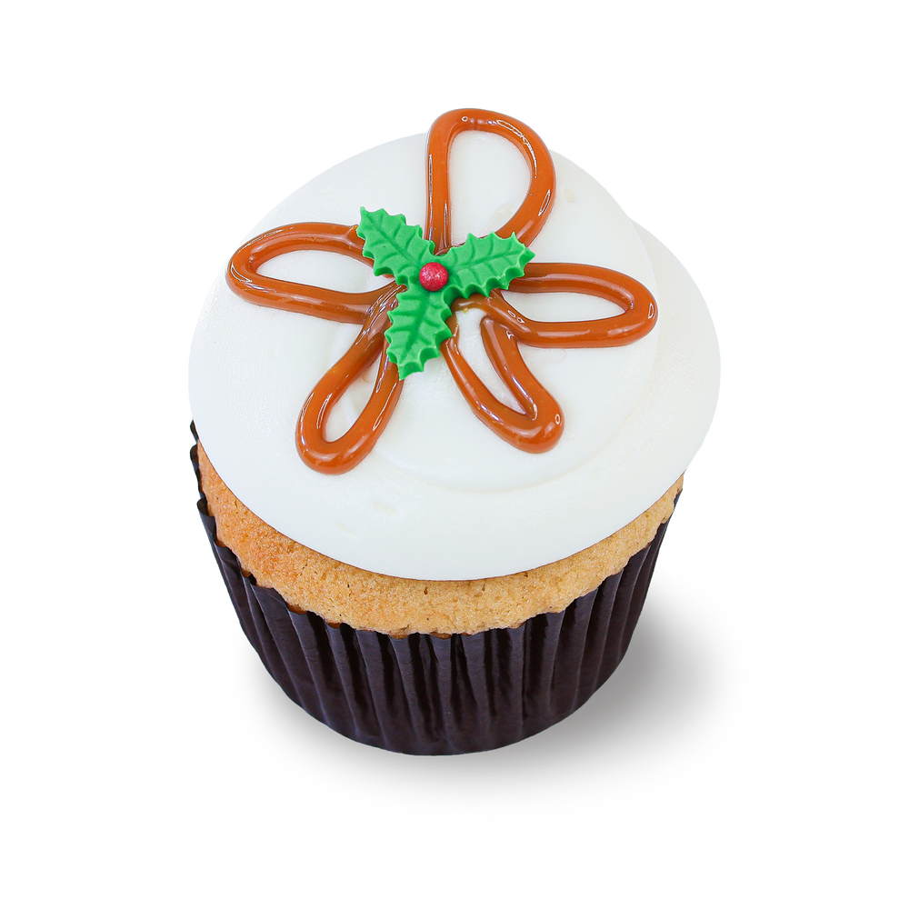 Toffee cupcake with caramel drizzle and holly