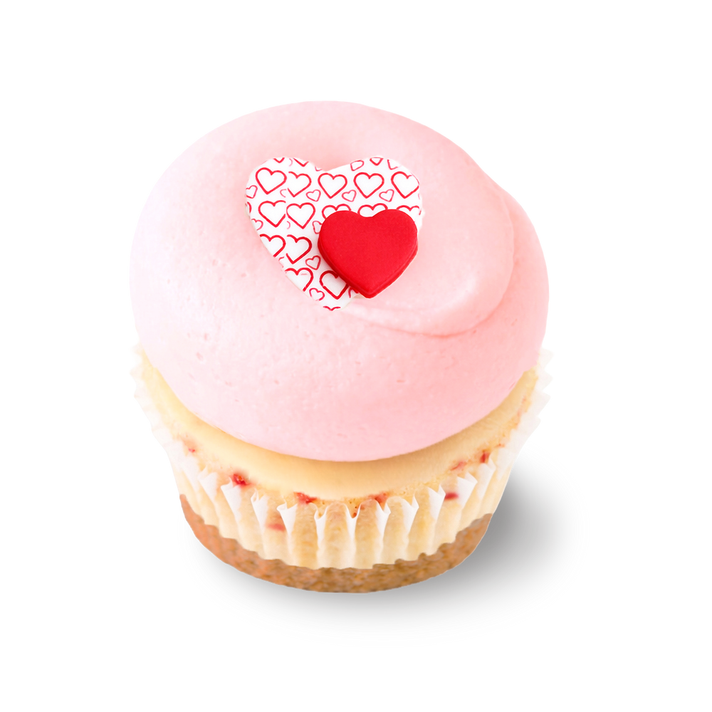 Strawberry cheesecake cupcake with heart decorations