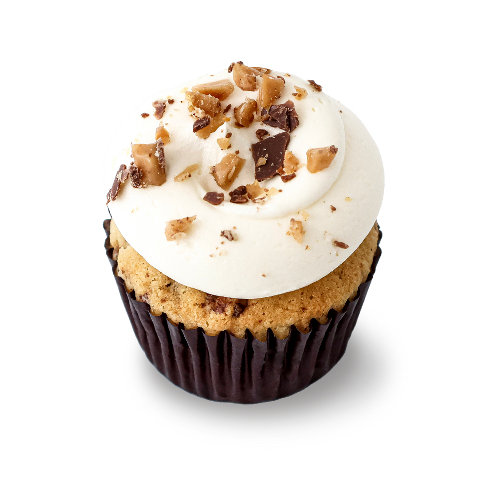 Toffee cheesecake cupcake with cream frosting and crunchy topping