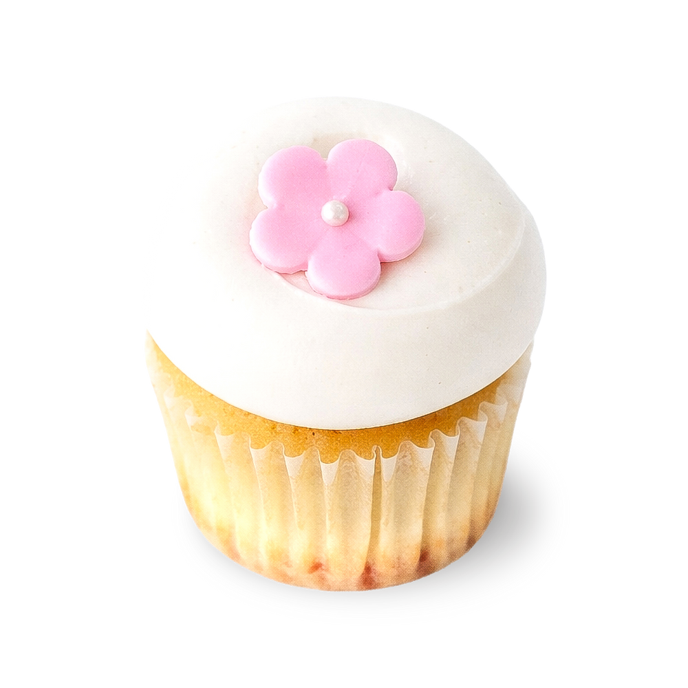 Vanilla cherry cupcake with pink frosting and blossom decoration