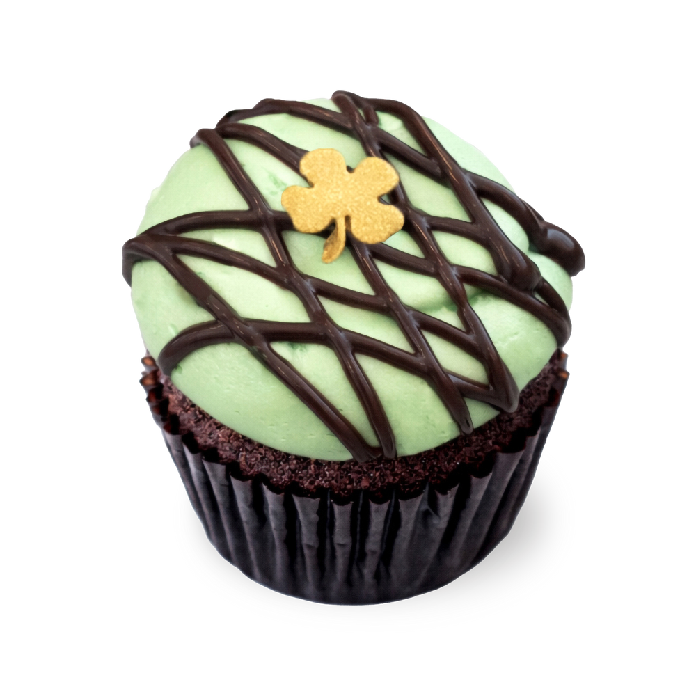 Chocolate cupcake with mint Irish cream frosting and clover decoration