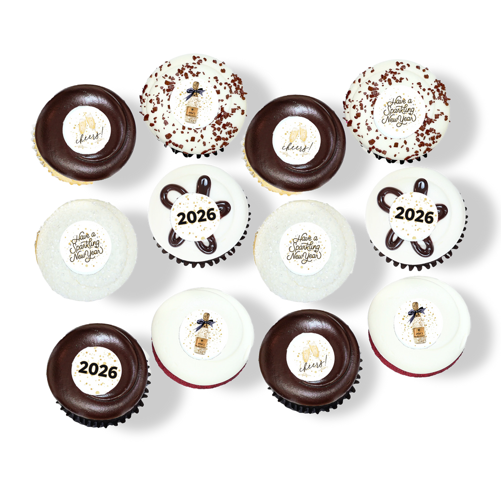 New Year cupcakes with “2026”, “cheers”, and champagne decorations
