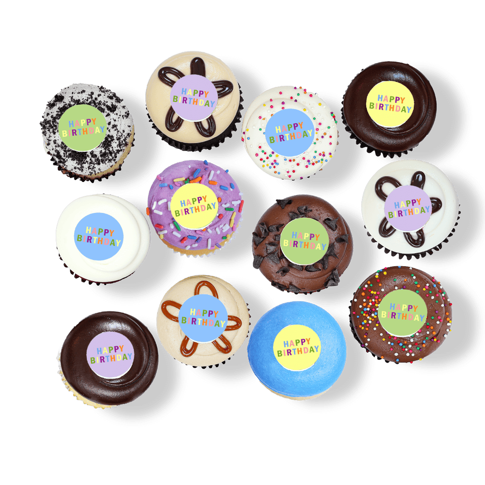 Cupcakes with colorful “Happy Birthday” toppers