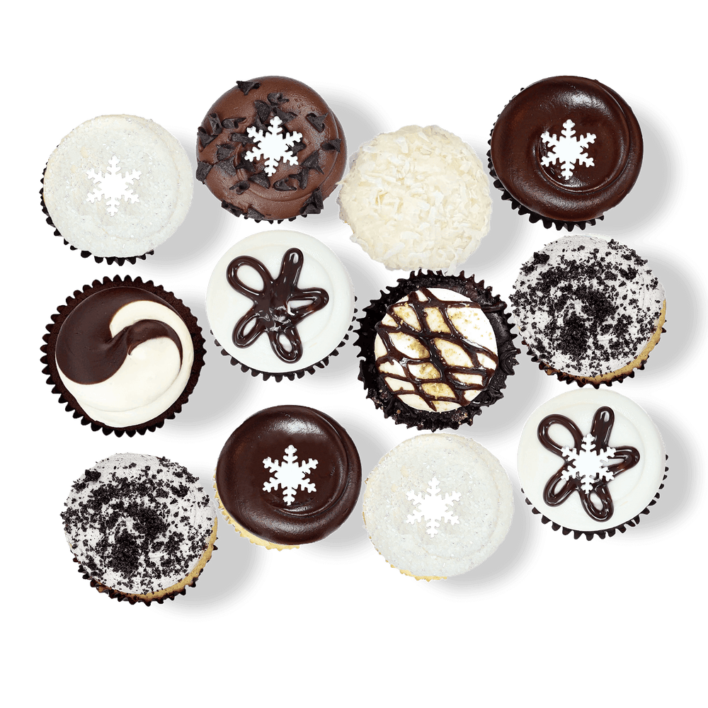 Cupcakes with chocolate, coconut, cookies and cream, and snowflake decorations