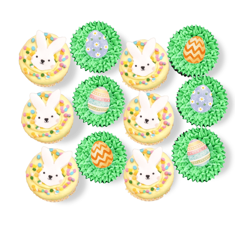 “Hoppy Easter” cupcakes with bunny faces and pastel eggs