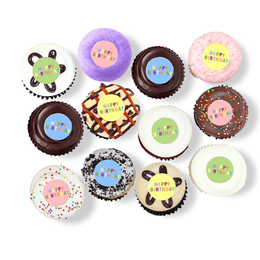 Cupcakes with colorful “Happy Birthday” toppers