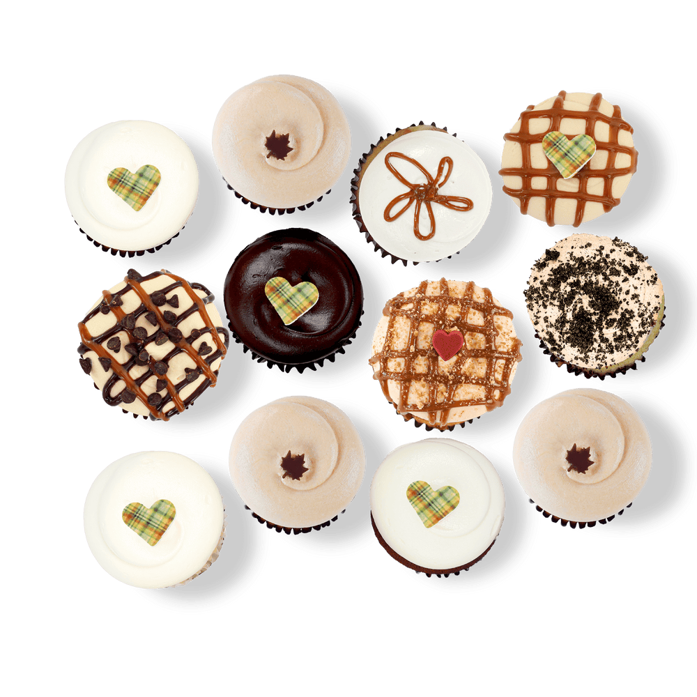 Fall cupcakes with caramel, chocolate, and seasonal decorations