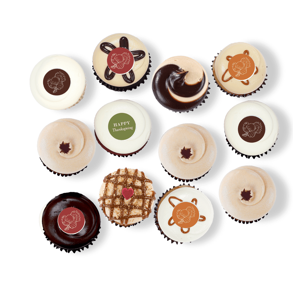 Thanksgiving cupcakes with fall decorations and seasonal flavors