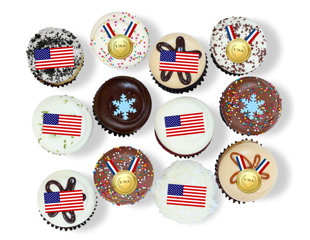 Cupcakes with gold medal, snowflake, and patriotic toppers